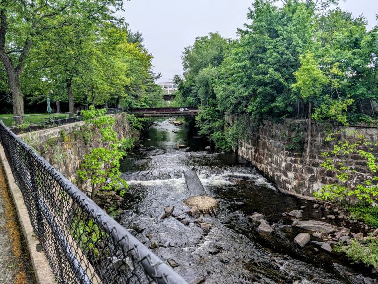 In town view of the Naugatuck along one of the small green space areas.