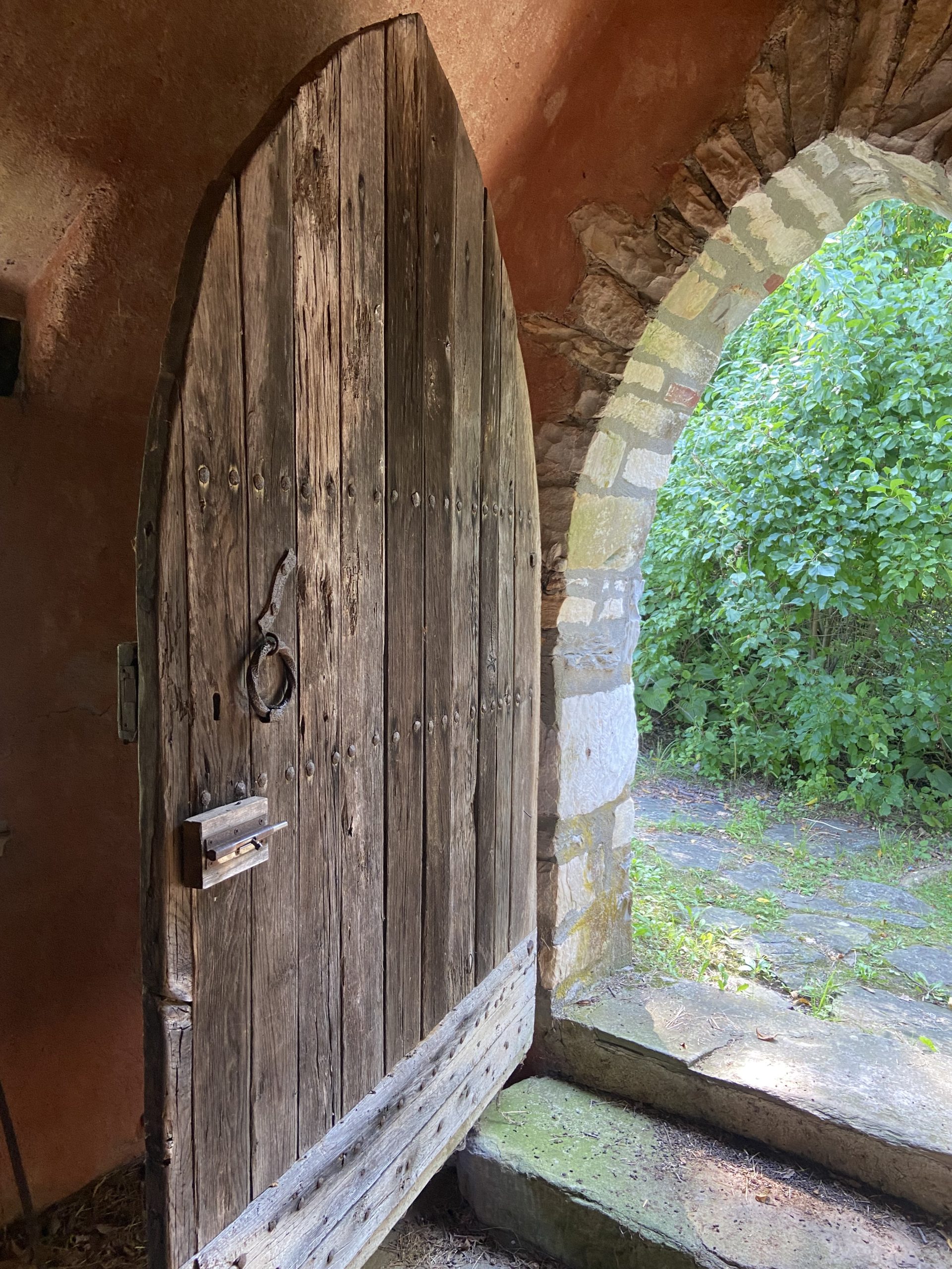 A magical stone hobbit house near the pool at Troutbeck
