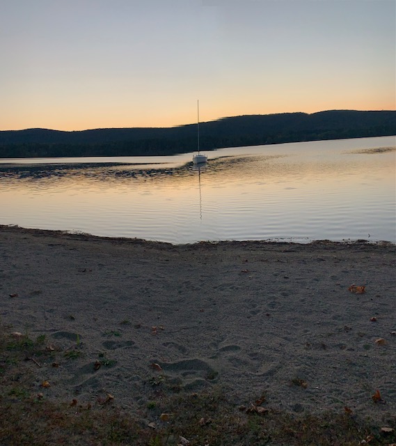 boat resting in Stockbridge Bowl at dusk